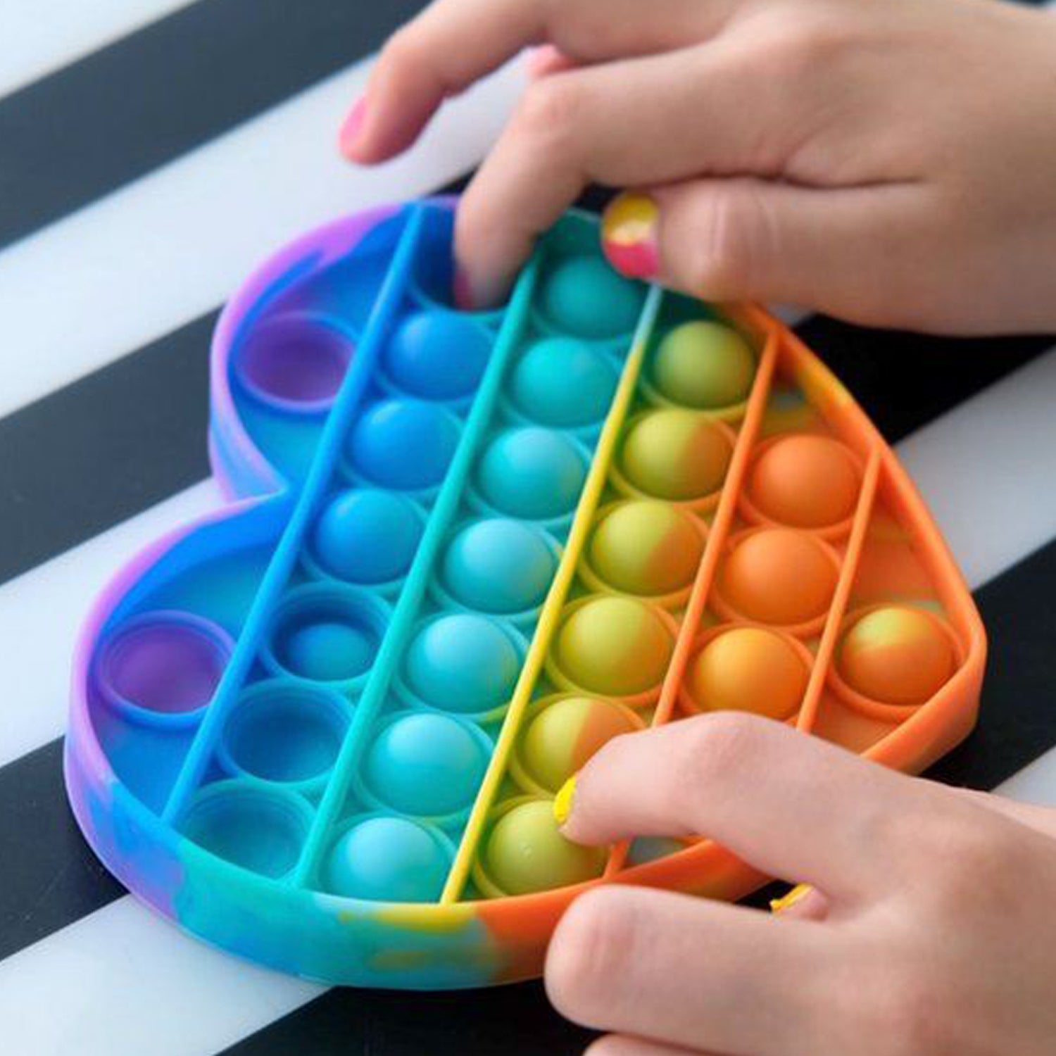 4608A Rainbow H Fidget Toy used in all kinds of household places specially for kids and children’s for playing purposes.